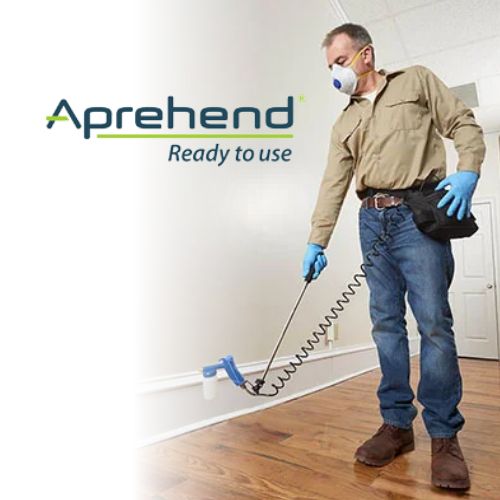 Technician applying Aprehend biopestice treatment against bed bugs