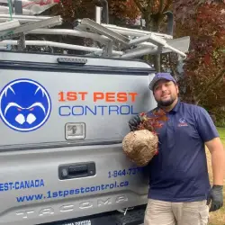one-of-dedicated-1st-pest-control-technicians-after-removing-a-wasp-nest-from-a-soffit One of the dedicated 1st pest control technicians after removing a wasp nest from a soffit